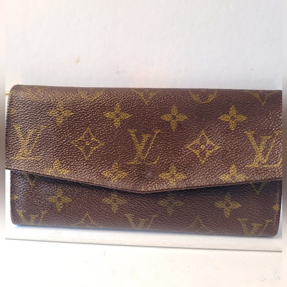 LOUIS VUITTON Monogram Leather Long Wallet - Picture 1 of 3